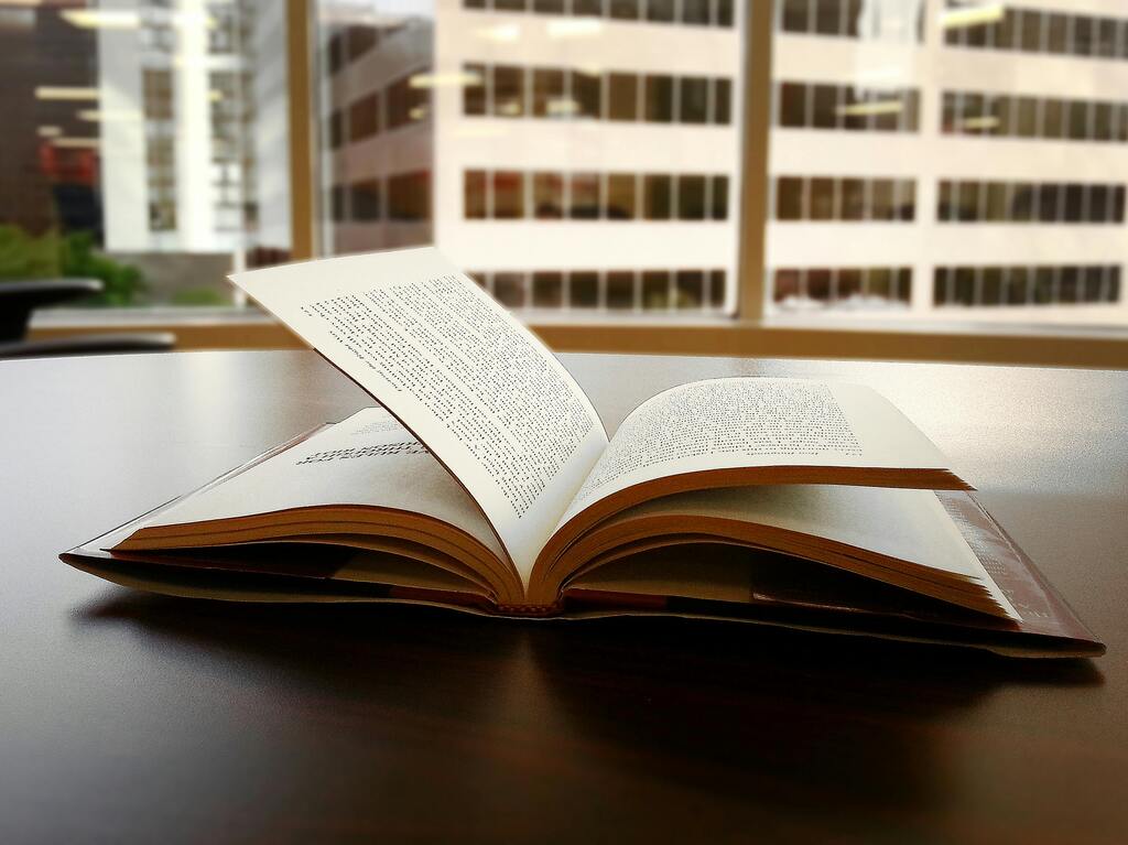 Open book on an office desk
